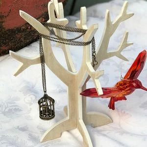 4/$20 jewelry SALE! Bird in birdcage necklace